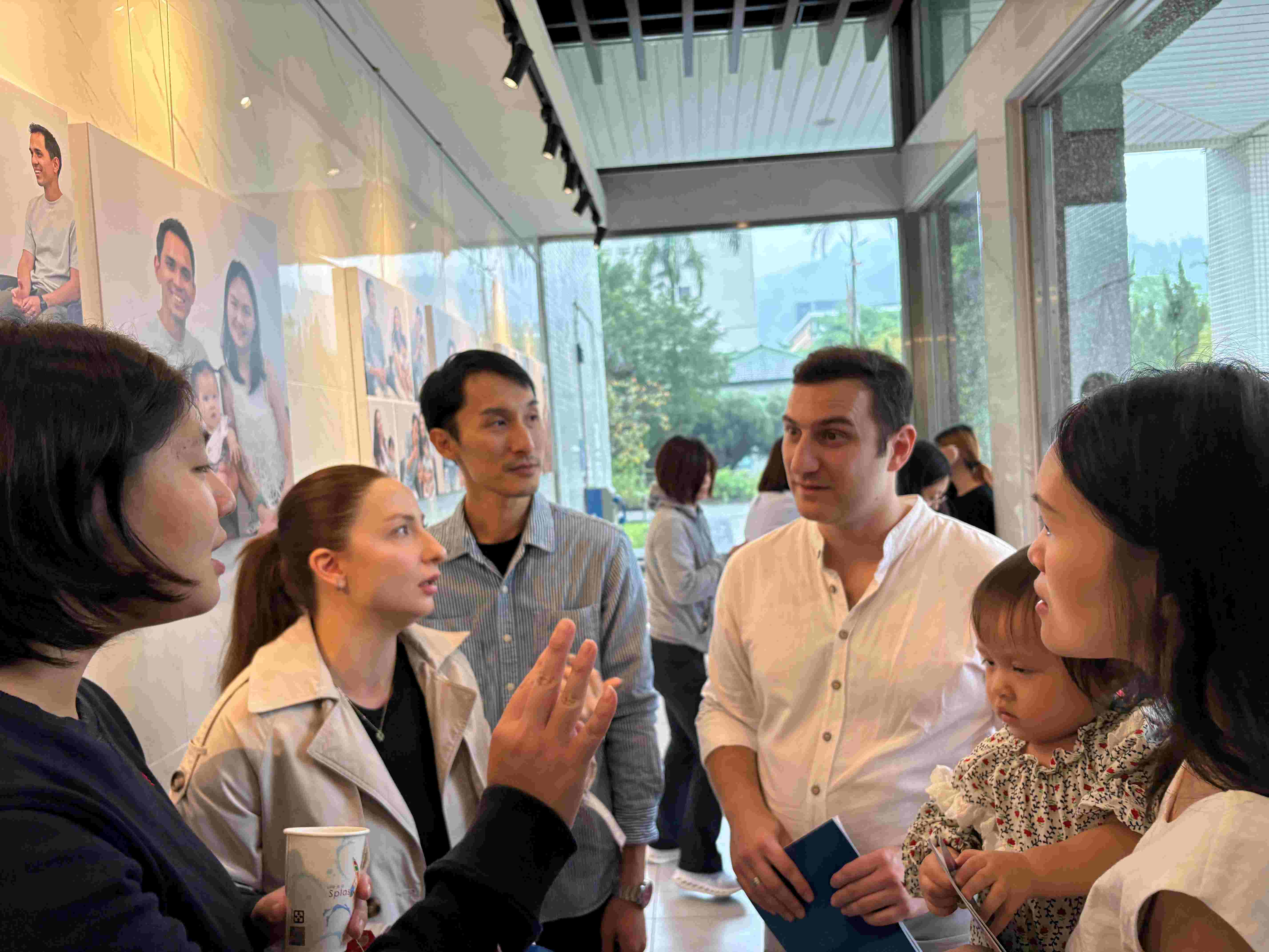 Invited guests sharing and exchanging life experiences at the venue